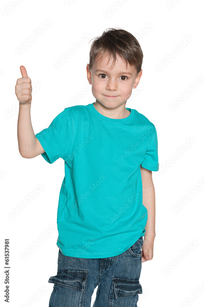 Fashion preschool boy holds his thumb up Fashion preschool boy holds his thumb up