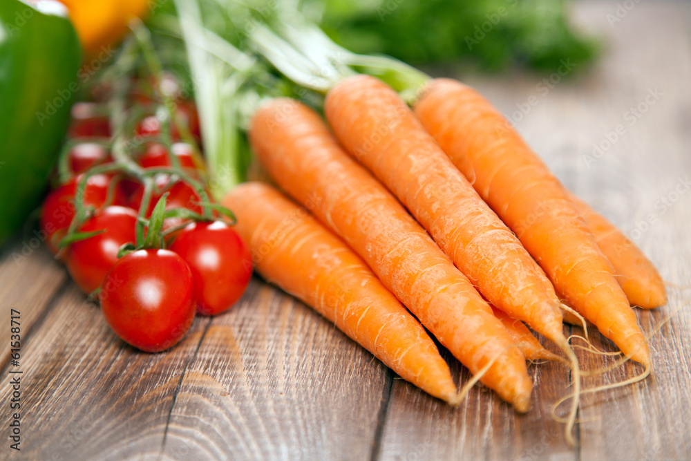 Fresh vegetables on a wooden table Fresh vegetables on a wooden table