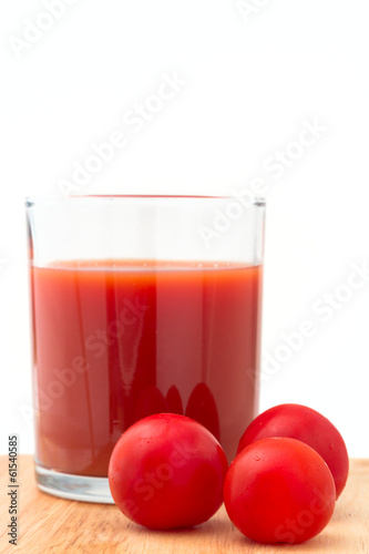 Red tomato and juice