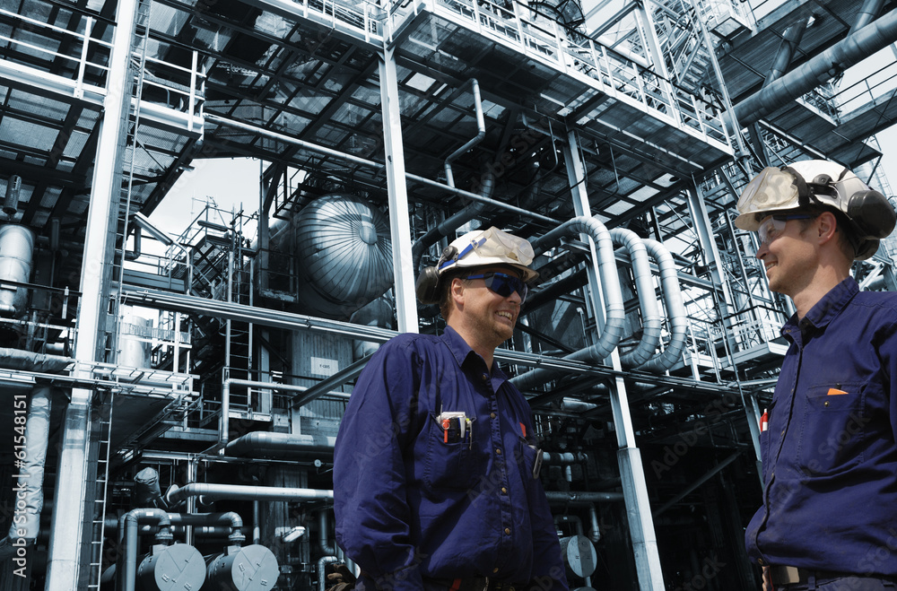 oil and gas worker, engineers inside refinery oil and gas worker, engineers inside refinery