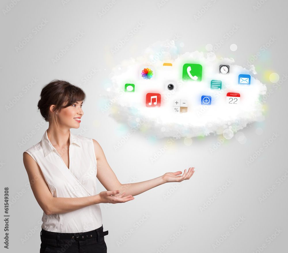 Young woman presenting cloud with colorful app icons and symbols Young woman presenting cloud with colorful app icons and symbols