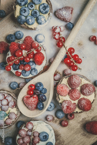 Berry tartlets in powdered sugar