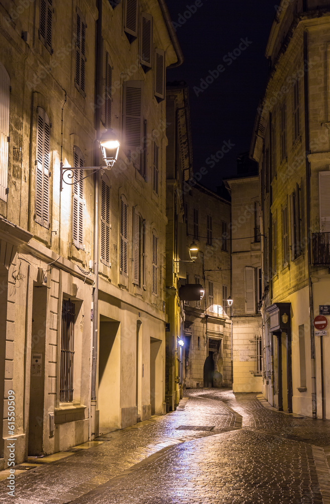 A street in night Avignon - France