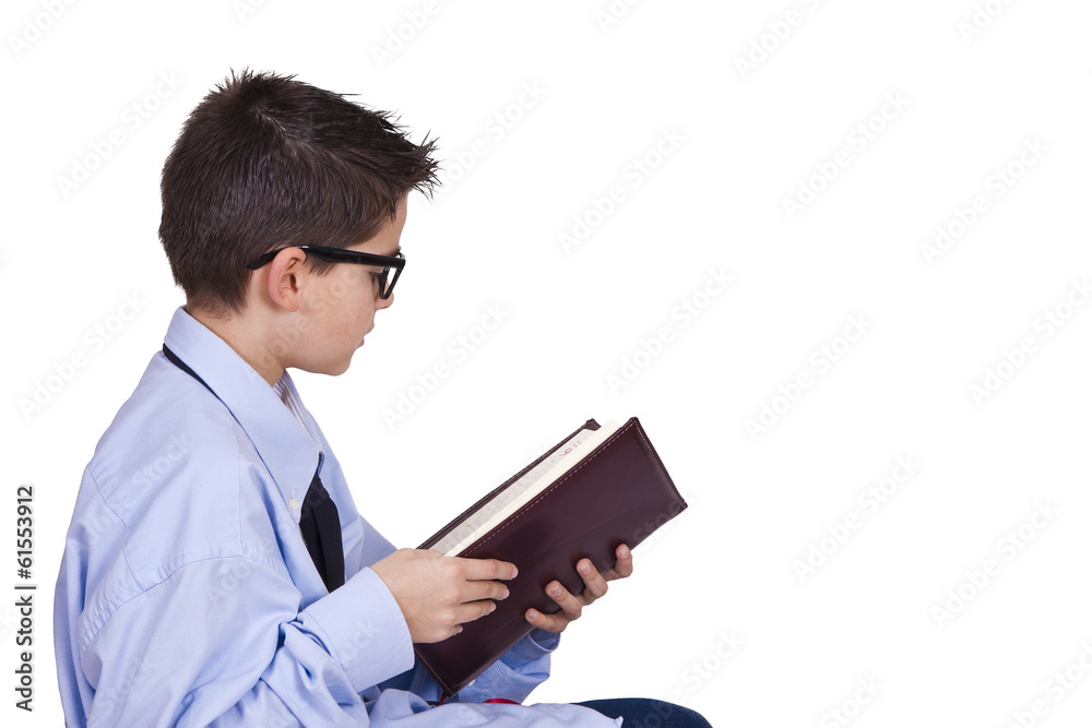 young man in business clothes reading the book young man in business clothes reading the book