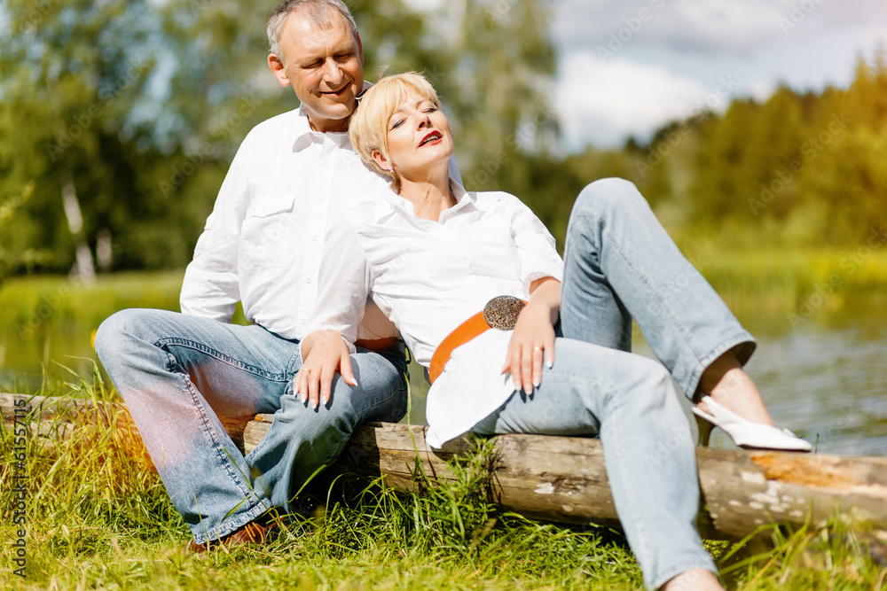 Happy senior couple outdoors in spring Happy senior couple outdoors in spring