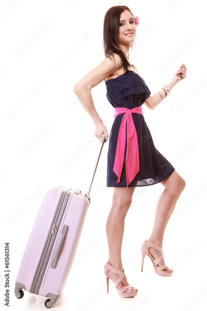 Girl tourist in dress walking with suitcase. Travel tourism. Girl tourist in dress walking with suitcase. Travel tourism.