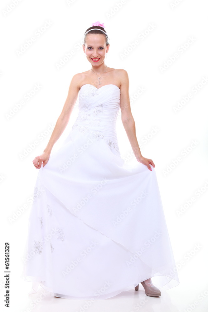 Wedding day. Romantic bride in white dress isolated