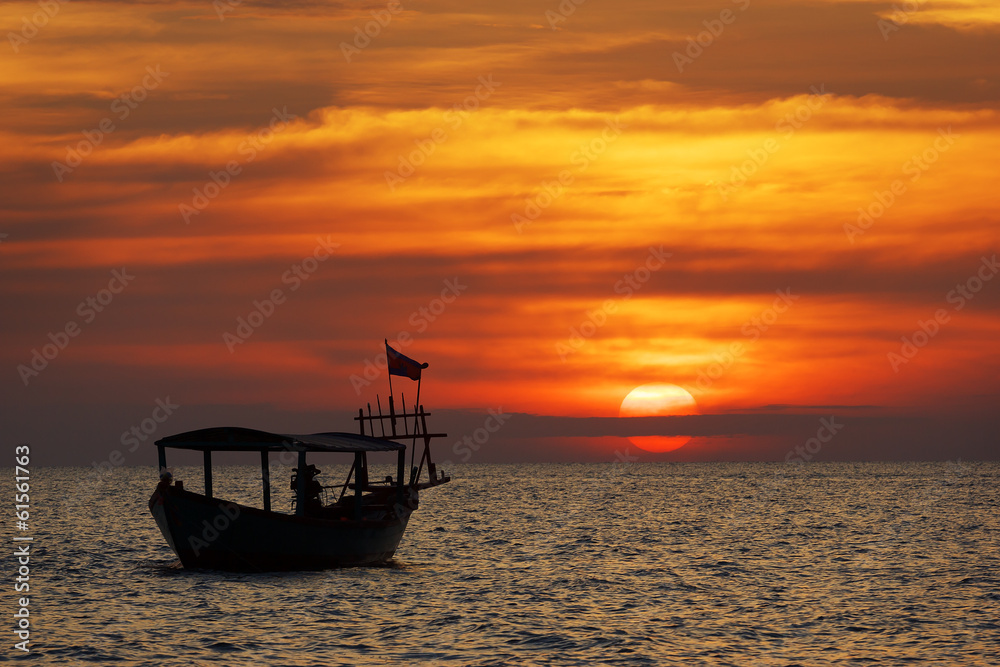 Amazing view of fishing boat at sunset in Cambodia