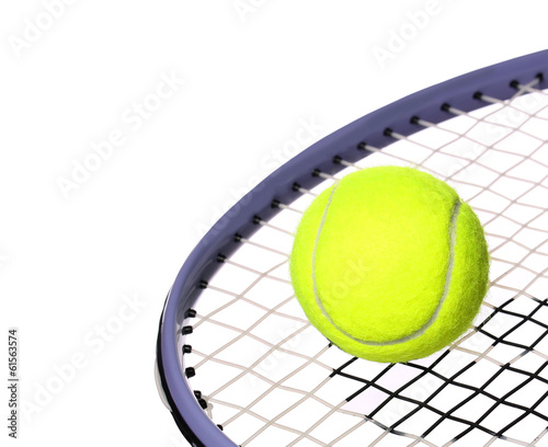Tennis Ball and Racket isolated on white background. Closeup © Guzel Studio