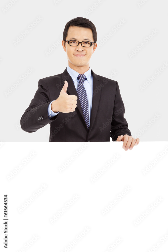 businessman holding white board and thumb up businessman holding white board and thumb up