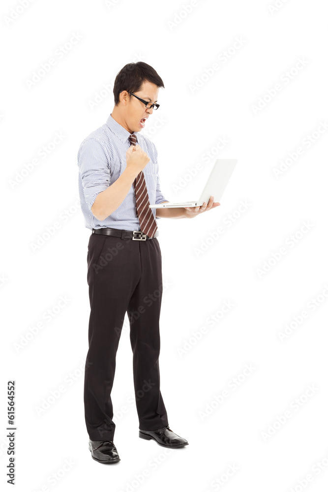 computer engineer is  standing and clench his hand