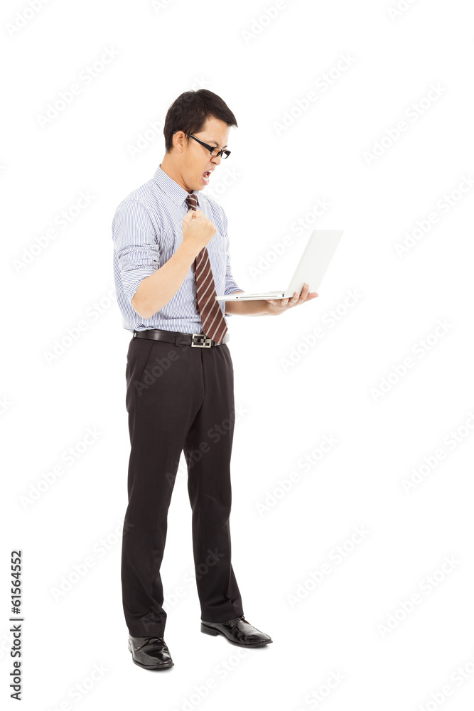 computer engineer is standing and clench his hand computer engineer is standing and clench his hand