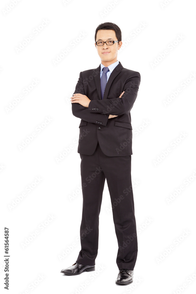 Confident businessman standing arms crossed Confident businessman standing arms crossed