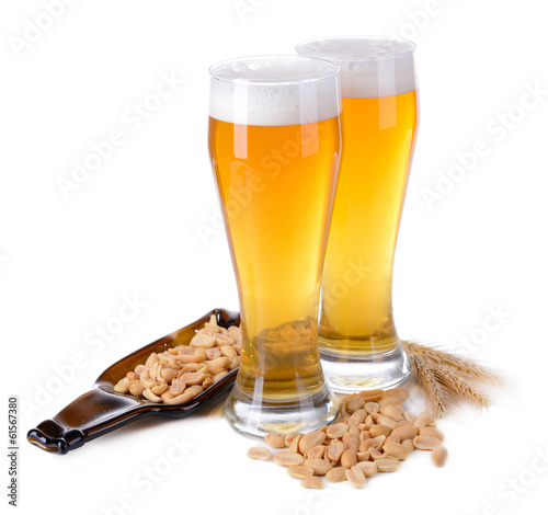 Glasses of beer with snack isolated on white