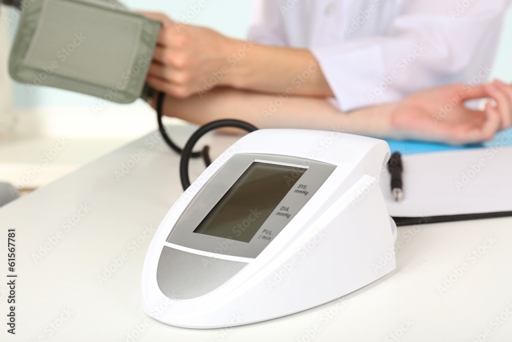 Measuring pressure of patient in hospital close-up Measuring pressure of patient in hospital close-up