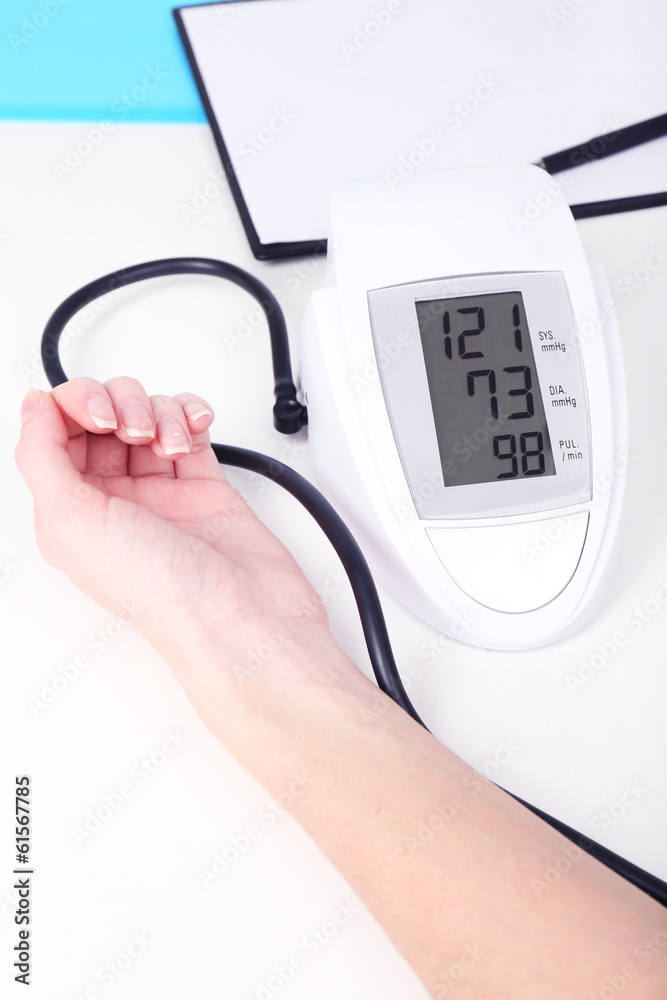 Measuring pressure of patient in hospital close-up Measuring pressure of patient in hospital close-up