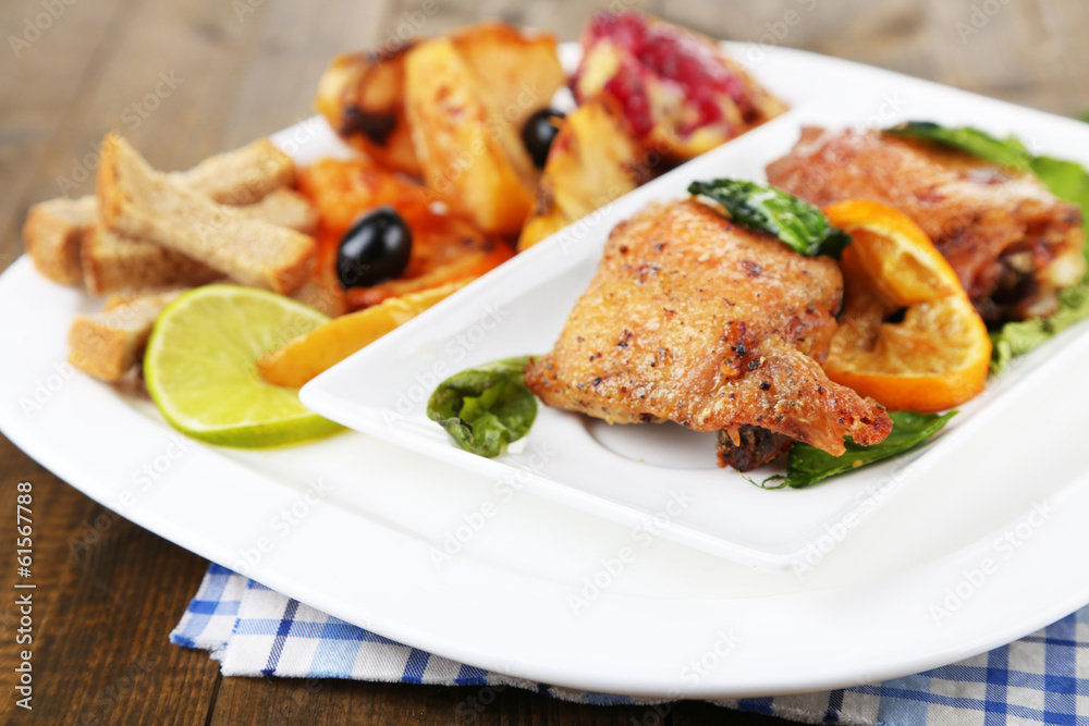 Homemade fried chicken drumsticks with vegetables Homemade fried chicken drumsticks with vegetables