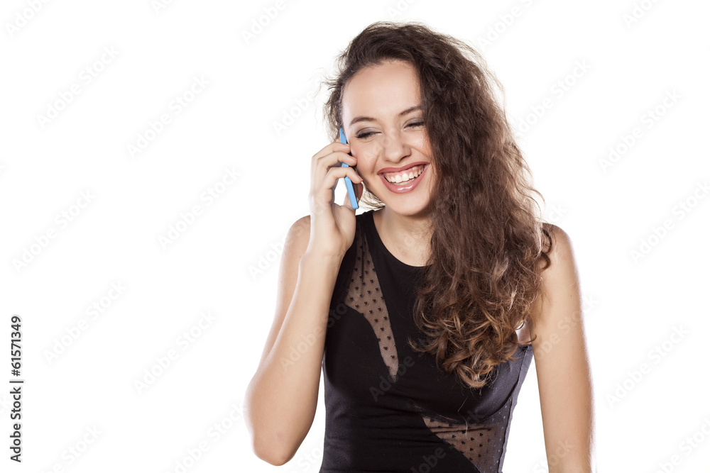 smiling young teenager girl talking on the phone smiling young teenager girl talking on the phone
