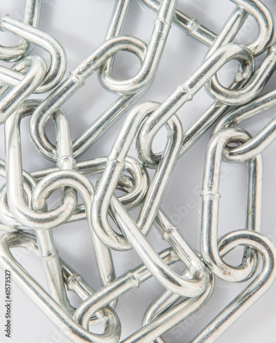 Steel chain over white background
