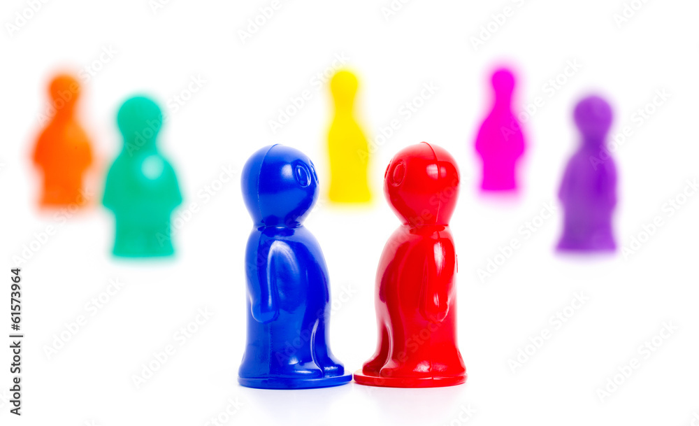 Meeting concept. Couple of a toy people face-to-face Meeting concept. Couple of a toy people face-to-face