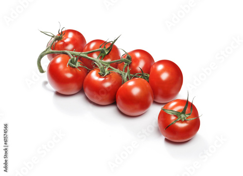red cherry tomatoes on a twig