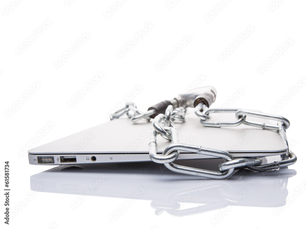 Laptop and chains over white background for PC security Laptop and chains over white background for PC security