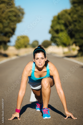 Female athlete ready for sprint running