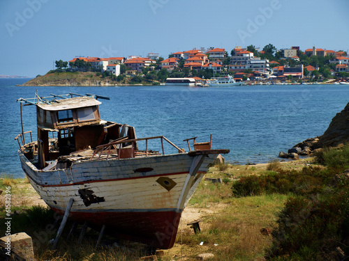 old, damaged boat on the shore in Ammouliani