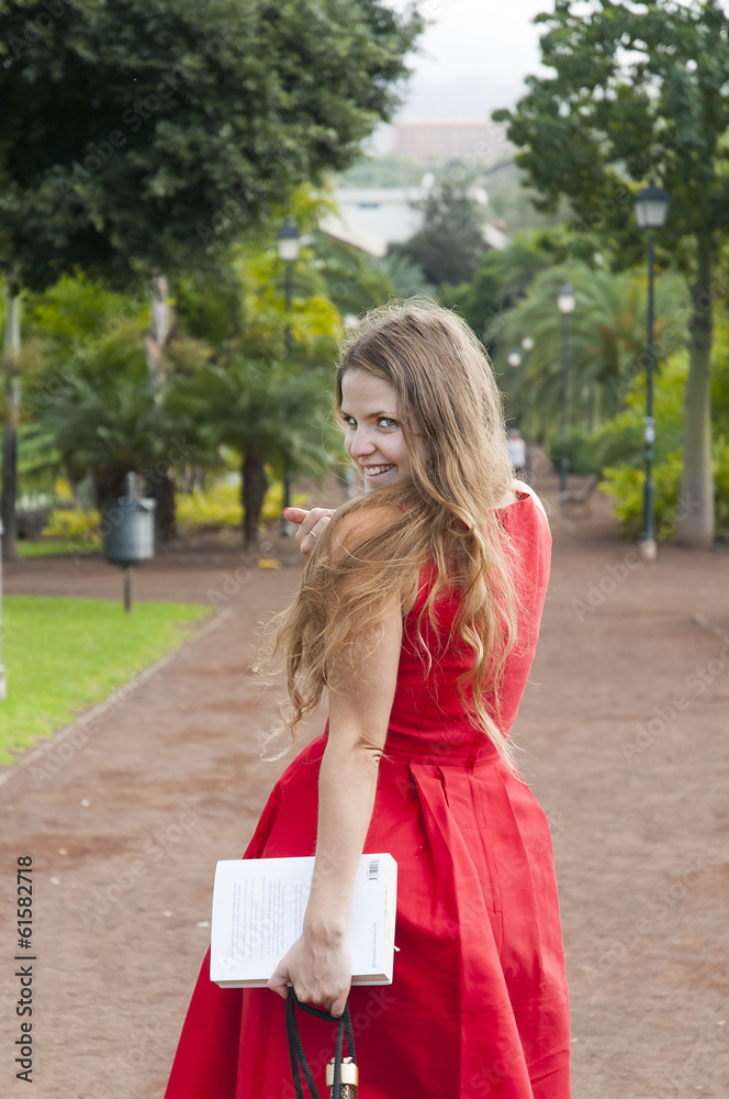 Beautiful Young Woman In A Red Dress. Tenerife. Park Taoro. Beautiful Young Woman In A Red Dress. Tenerife. Park Taoro.