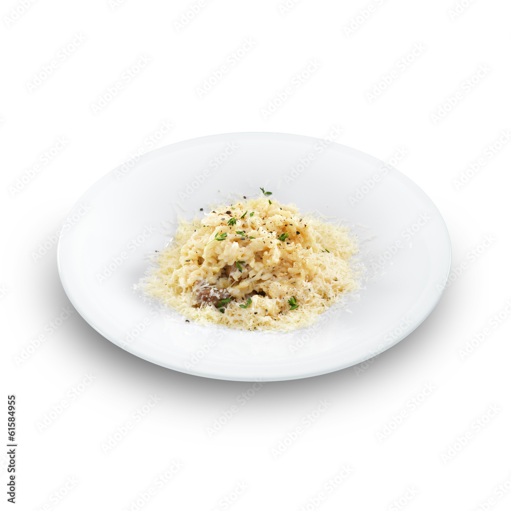 Risotto - rice cooked with broth and sprinkled with grated chees