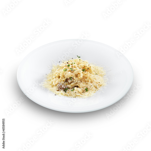 Risotto - rice cooked with broth and sprinkled with grated chees