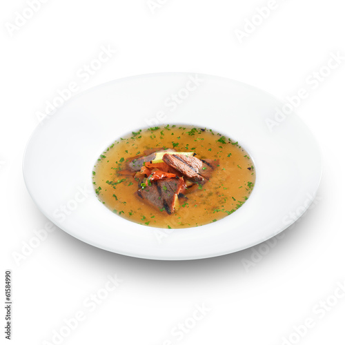 Delicious hot grill soup with grilled meat and vegetables is ser