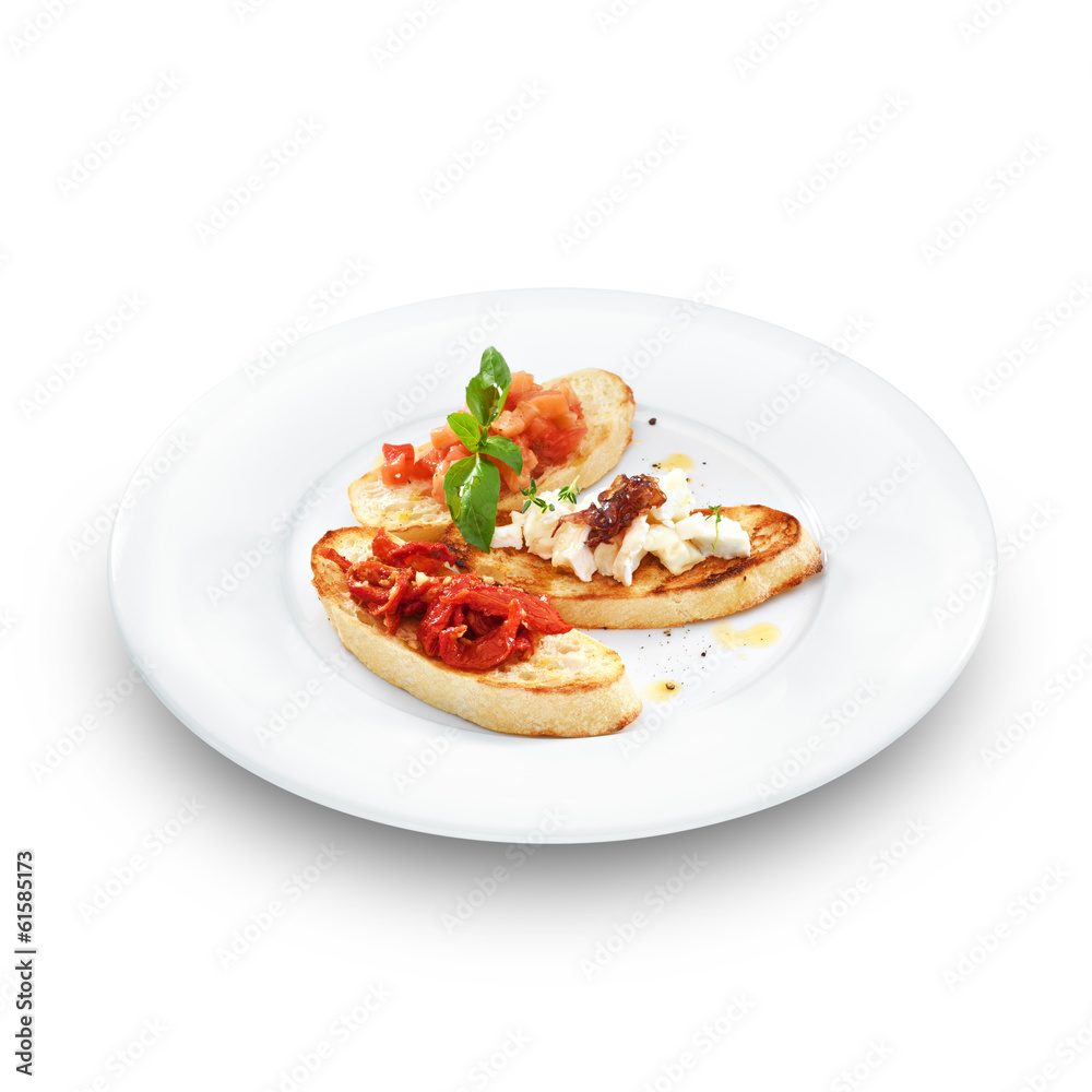 Assorted bruschetta with salmon, air-dry tomatoes or goat cheese Assorted bruschetta with salmon, air-dry tomatoes or goat cheese