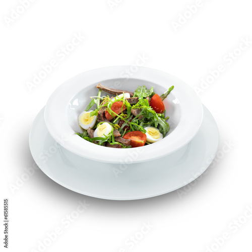 Warm delicious italian salad with beef tongue and arugula on a w