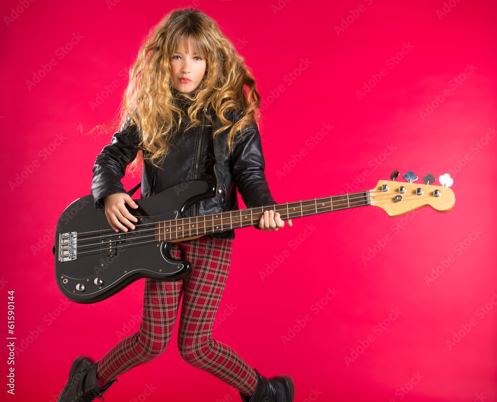 Fototapeta premium Blond Rock and roll girl with bass guitar on red
