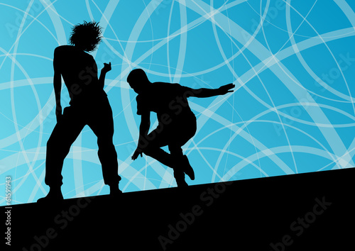 Active young man and woman street break dancers silhouettes in a