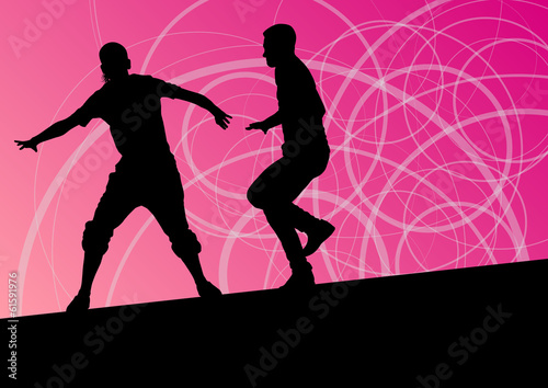 Active young man and woman street break dancers silhouettes in a