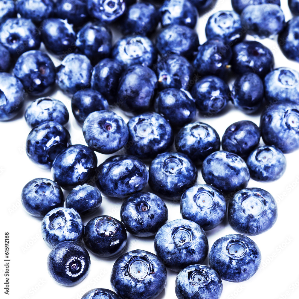 Blueberries isolated on white background close up. Group of fres Blueberries isolated on white background close up. Group of fres