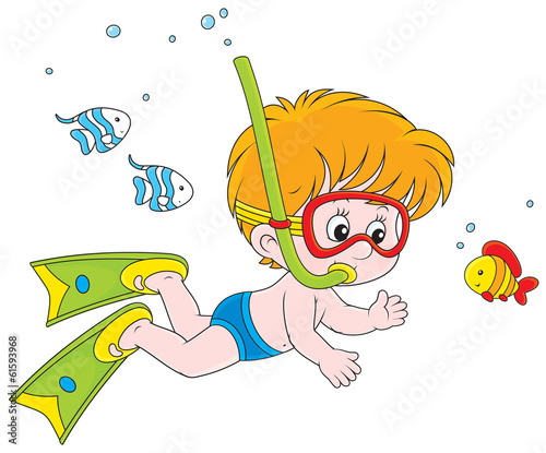 boy diving with a mask and ...
