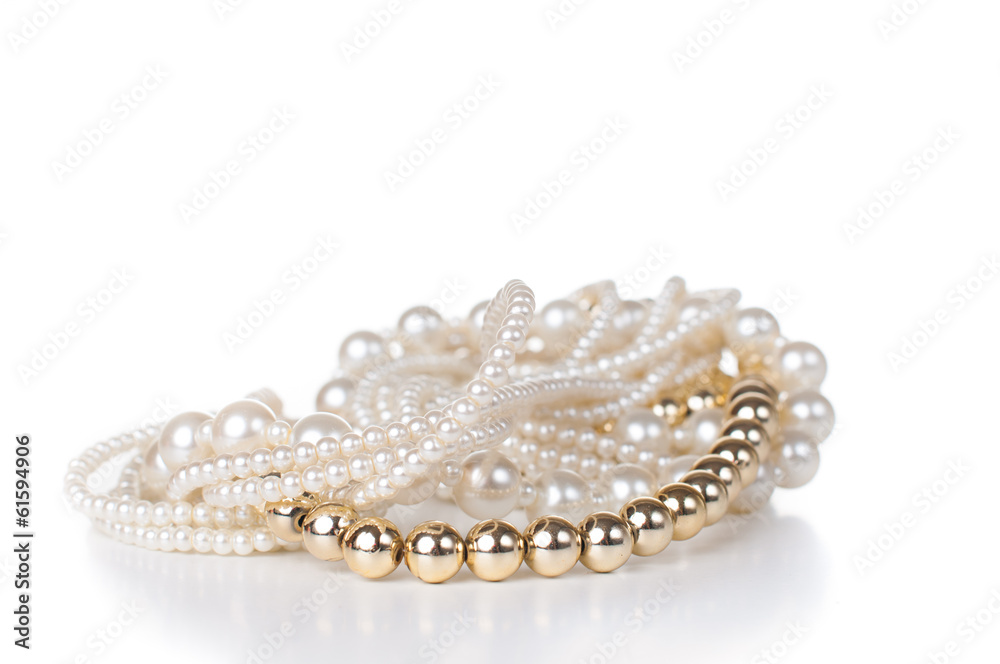 jewelry made ​​of gold and white pearls