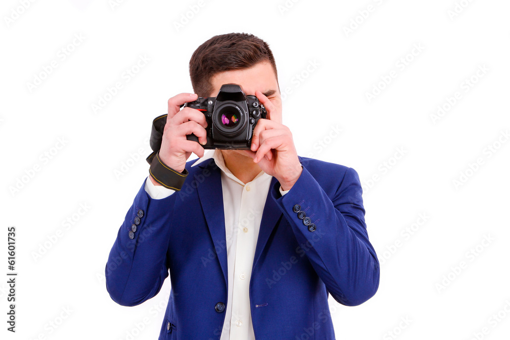 Male photographer with his camera isolated on white background Male photographer with his camera isolated on white background