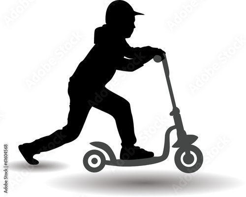 The boy rolls a scooter