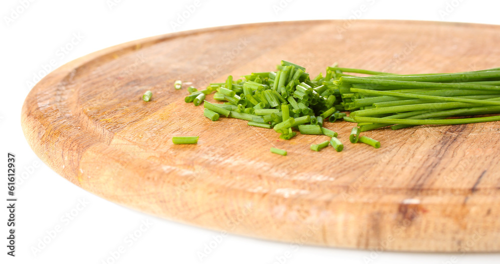 beautiful green onion chives on wooden board isolated on white beautiful green onion chives on wooden board isolated on white