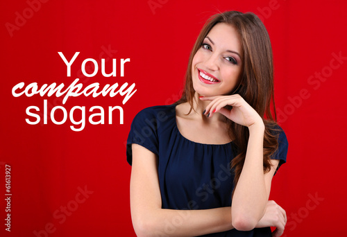 Attractive woman on color b...