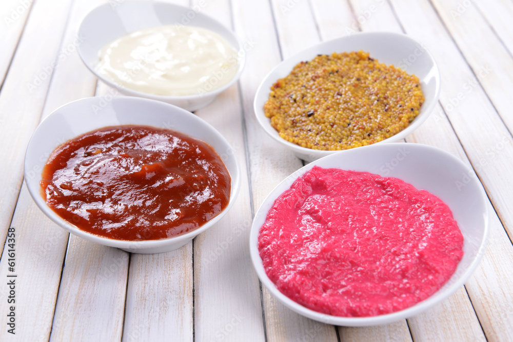 Various sauces on table close-up Various sauces on table close-up