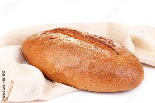 Rye bread on napkin isolated on white