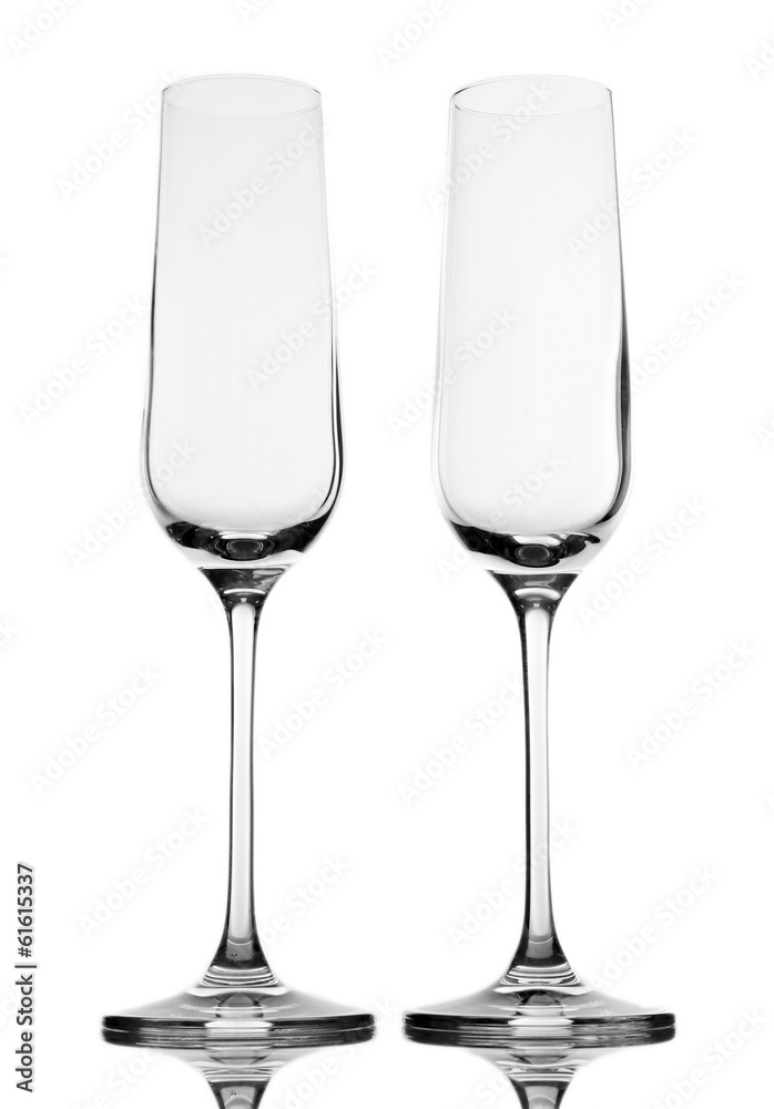 Empty champagne glasses, isolated on white