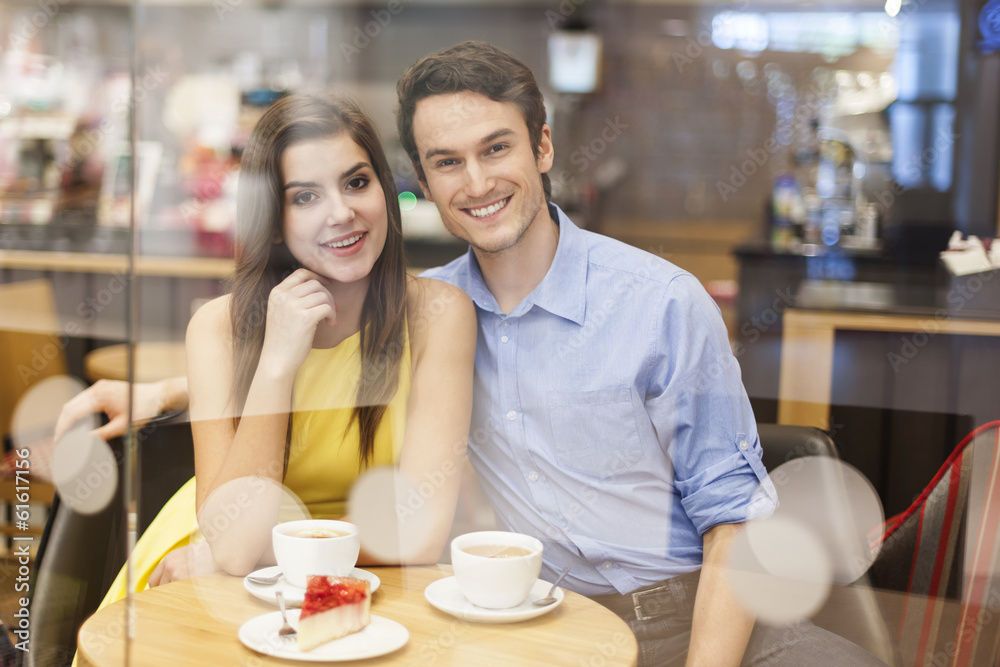 Portrait of beautiful couple in cafe Portrait of beautiful couple in cafe