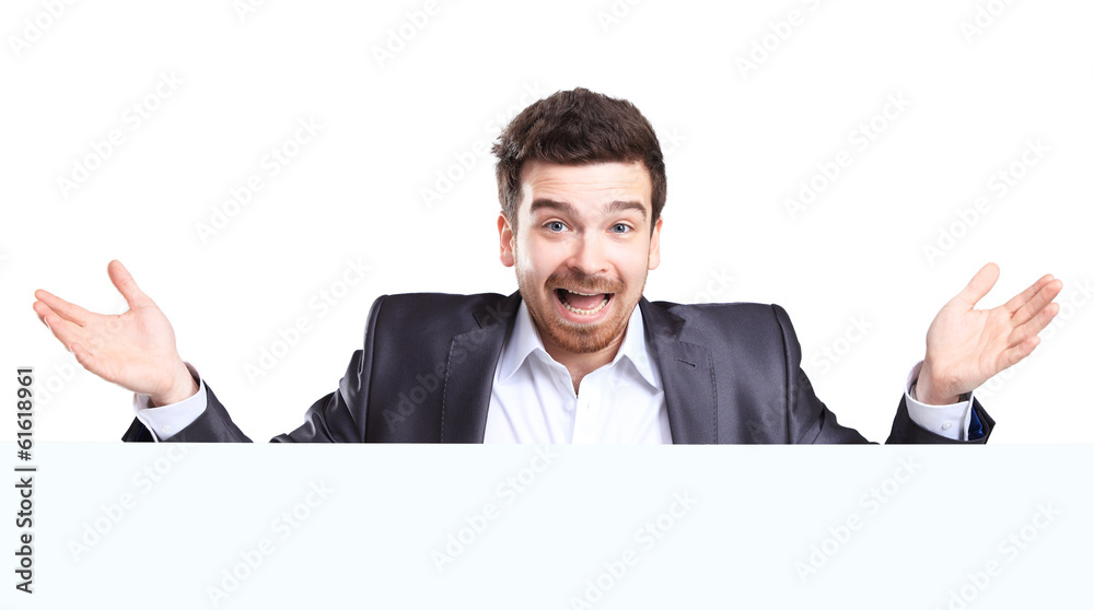 Happy business man with shocked facial expression presenting Happy business man with shocked facial expression presenting