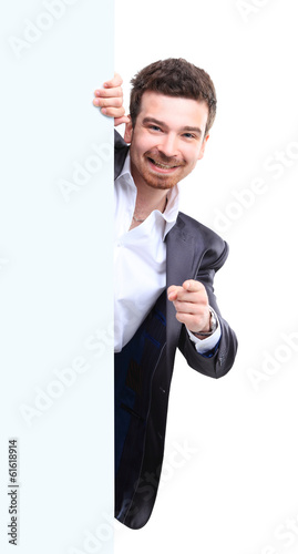 Happy business man presenting with copy space for your text